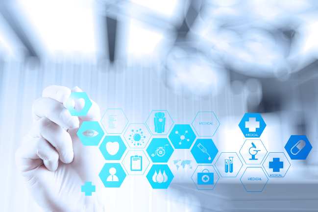 A gloved hand with a stylist selecting an icon out of a group of icons.